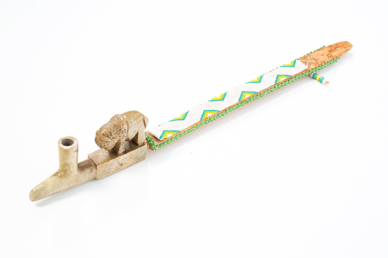 LARGE NATIVE AMERICAN STONE BUFFALO EFFIGY PIPE WITH BEADED WOODEN STEM. (1 of 5)