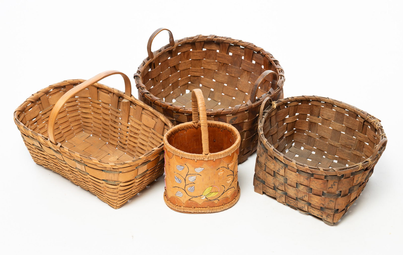 FOUR NATIVE AMERICAN BASKETS (1 of 4)