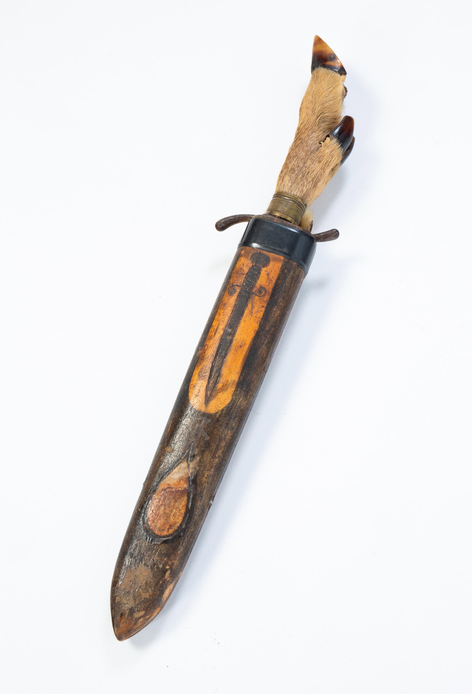 MOGAL CUTLERY CO. (CZECHOSLOVAKIA) DEER HOOF HUNTING DAGGER WITH INCISED WOODEN SHEATH.: MOGAL CUTLERY CO. (CZECHOSLOVAKIA) DEER HOOF HUNTING DAGGER WITH INCISED WOODEN SHEATH. Czech Republic, 20th Century. Deer hoof handle on steel blade marked "Mogal Cutlery Co. Made in