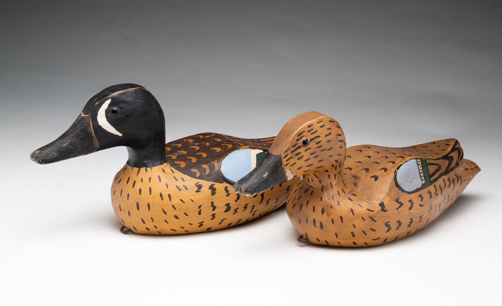 PAIR OF CARVED AND PAINTED BLUE-WINGED TEAL DUCK DECOYS. (1 of 7)