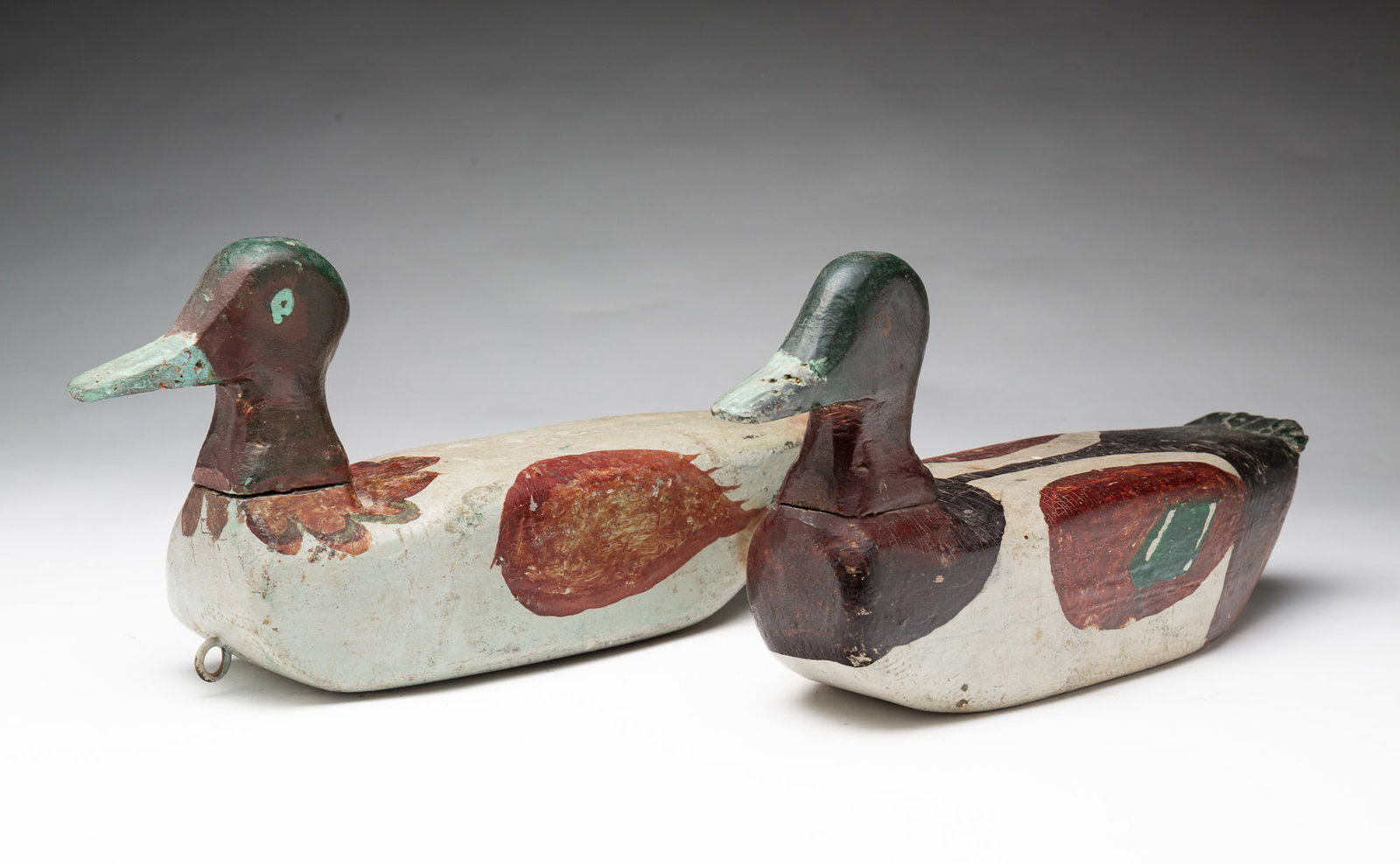 PAIR OF FOLKSY CARVED AND PAINTED DUCK DECOYS. (1 of 7)
