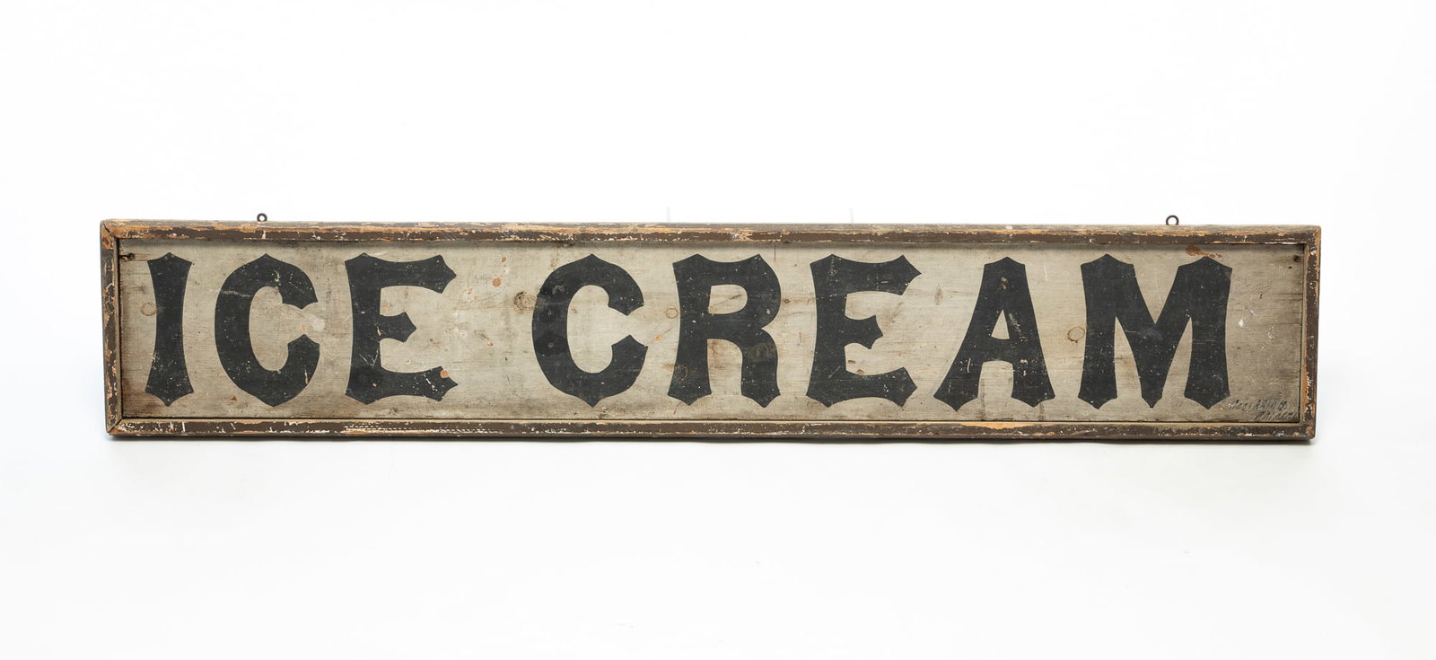 LARGE ICE CREAM PAINTED TRADE SIGN.: LARGE ICE CREAM PAINTED TRADE SIGN. American, Late 19th - early 20th Century. Framed painted wooden sign lettered "ICE CREAM" in black. 11.5"h. 64.75"w. Provenance: From the Lifetime Collection of Mar