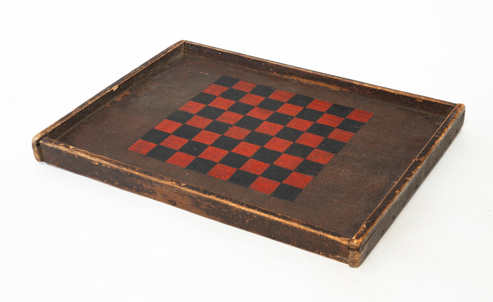 FOLK ART PAINT-DECORATED WOODEN GAMEBOARD.: FOLK ART PAINT-DECORATED WOODEN GAMEBOARD. American, 19th Century. Having simple construction with square nails, red and black game surface on a brown ground, and gallery edges. 19.25"h. 14.25"w.