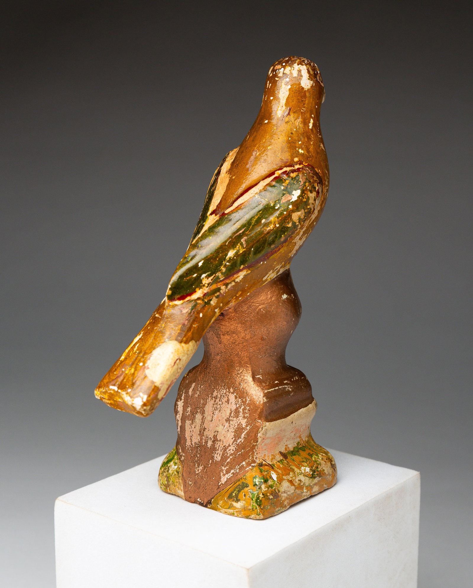 CHALKWARE BIRD ON PLINTH. - 2