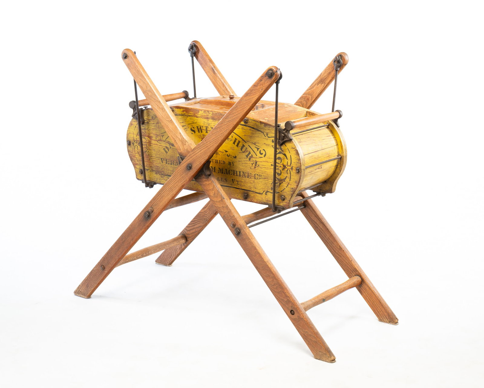 NEW ENGLAND CRADLE-FORM WOODEN BUTTER CHURN WITH ORIGINAL YELLOW PAINT AND STENCILING. (1 of 6)