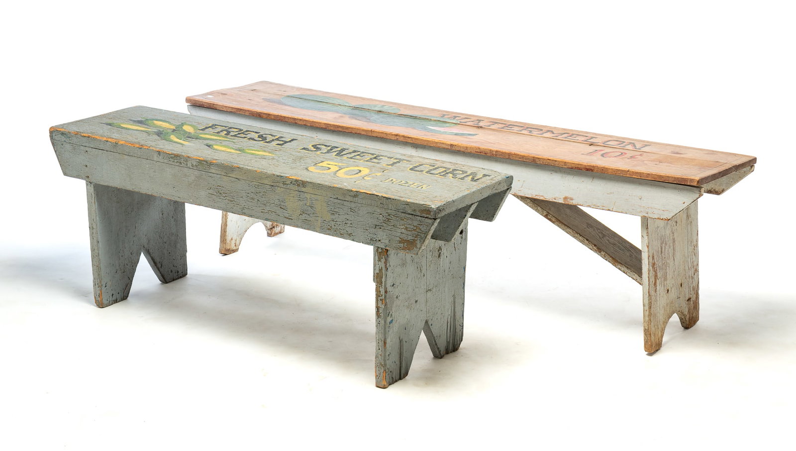 TWO FARM PRODUCE STAND ADVERTISING BENCHES.: TWO FARM PRODUCE STAND ADVERTISING BENCHES. American, 20th Century. The larger with two board top, side battens, slightly splayed legs with half-round cut-outs, white paint, and shaded lettering on