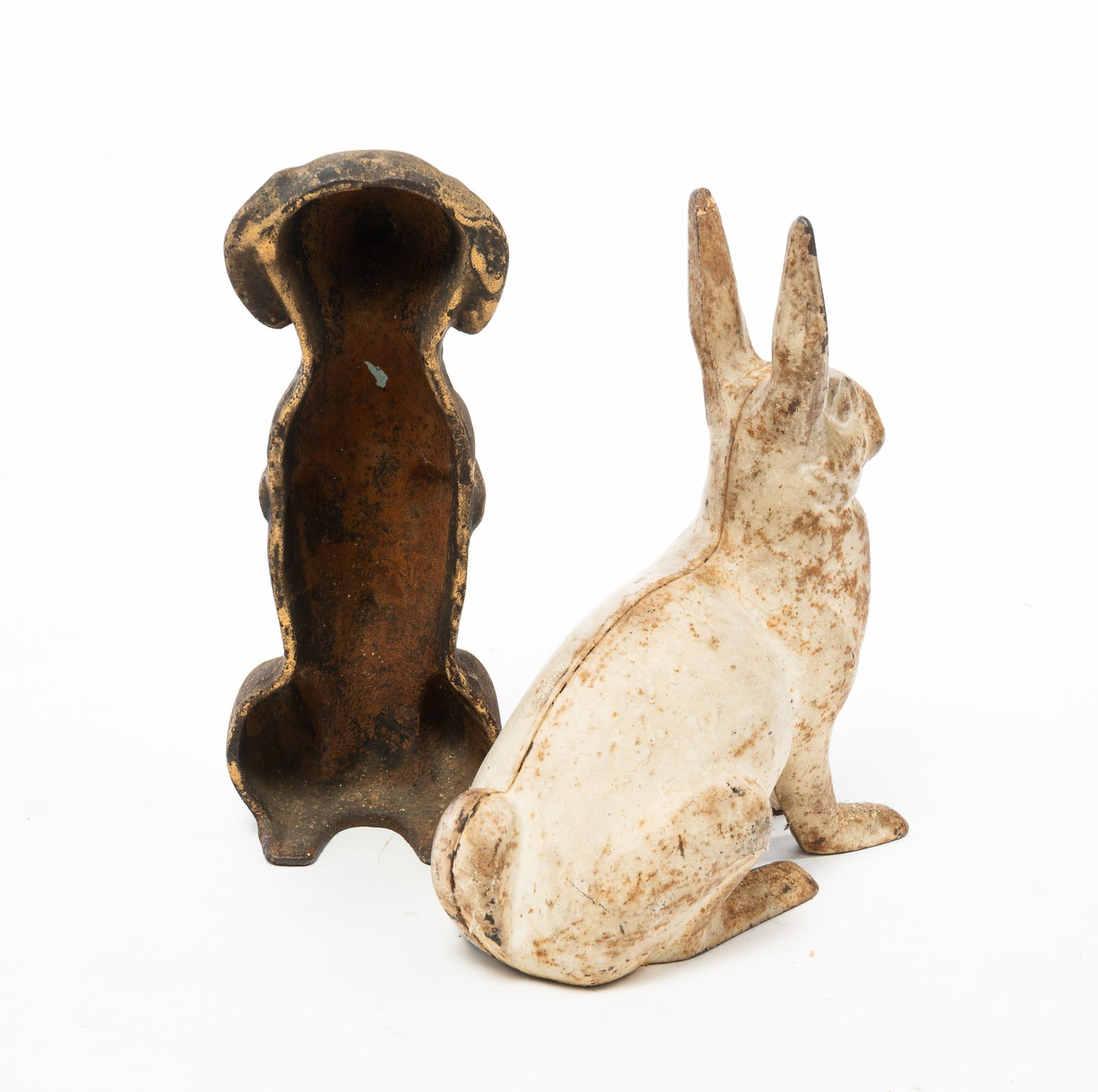 TWO CAST IRON DOORSTOPS. - 2