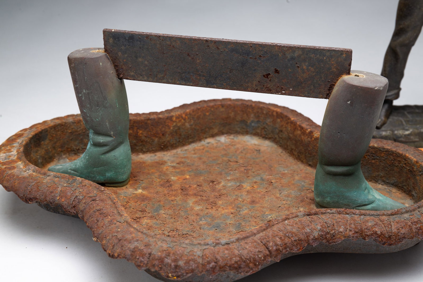 THREE METAL ITEMS INCLUDING A BOOT SCRAPER. - 3