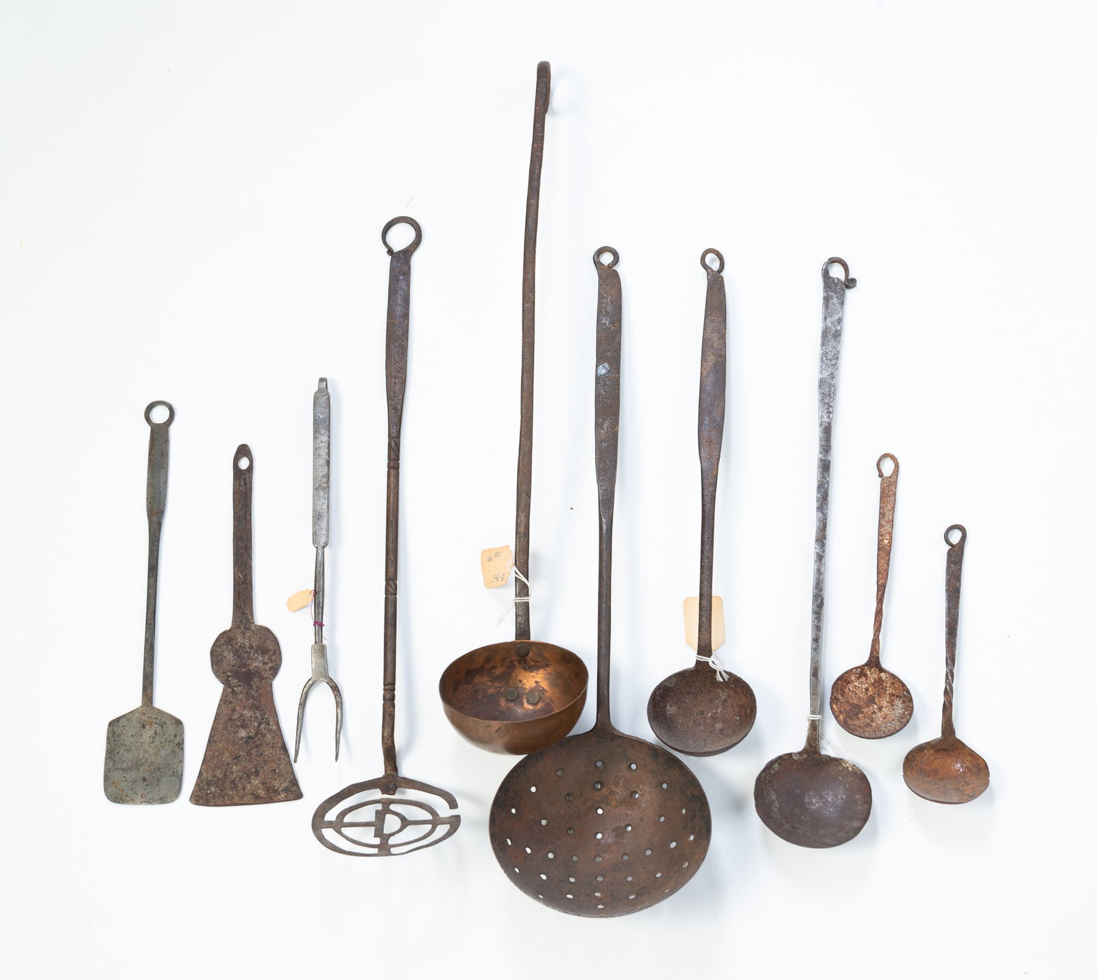 TEN EARLY WROUGHT IRON UTENSILS, INCLUDING SKIMMERS AND LADLES. (1 of 8)