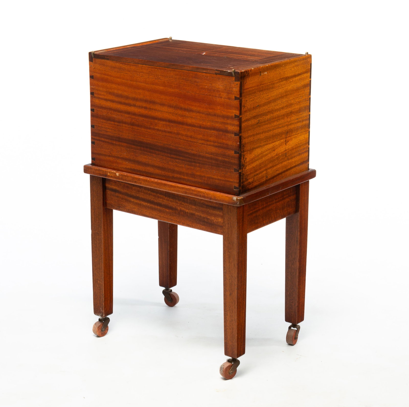 MAHOGANY FILE BOX-ON-STAND.: MAHOGANY FILE BOX-ON-STAND. American, Early 20th Century. Double-hinged lid with breadboard ends, dovetailed case, and interior sliding file holder. Base with edge moldings, square legs, and wood