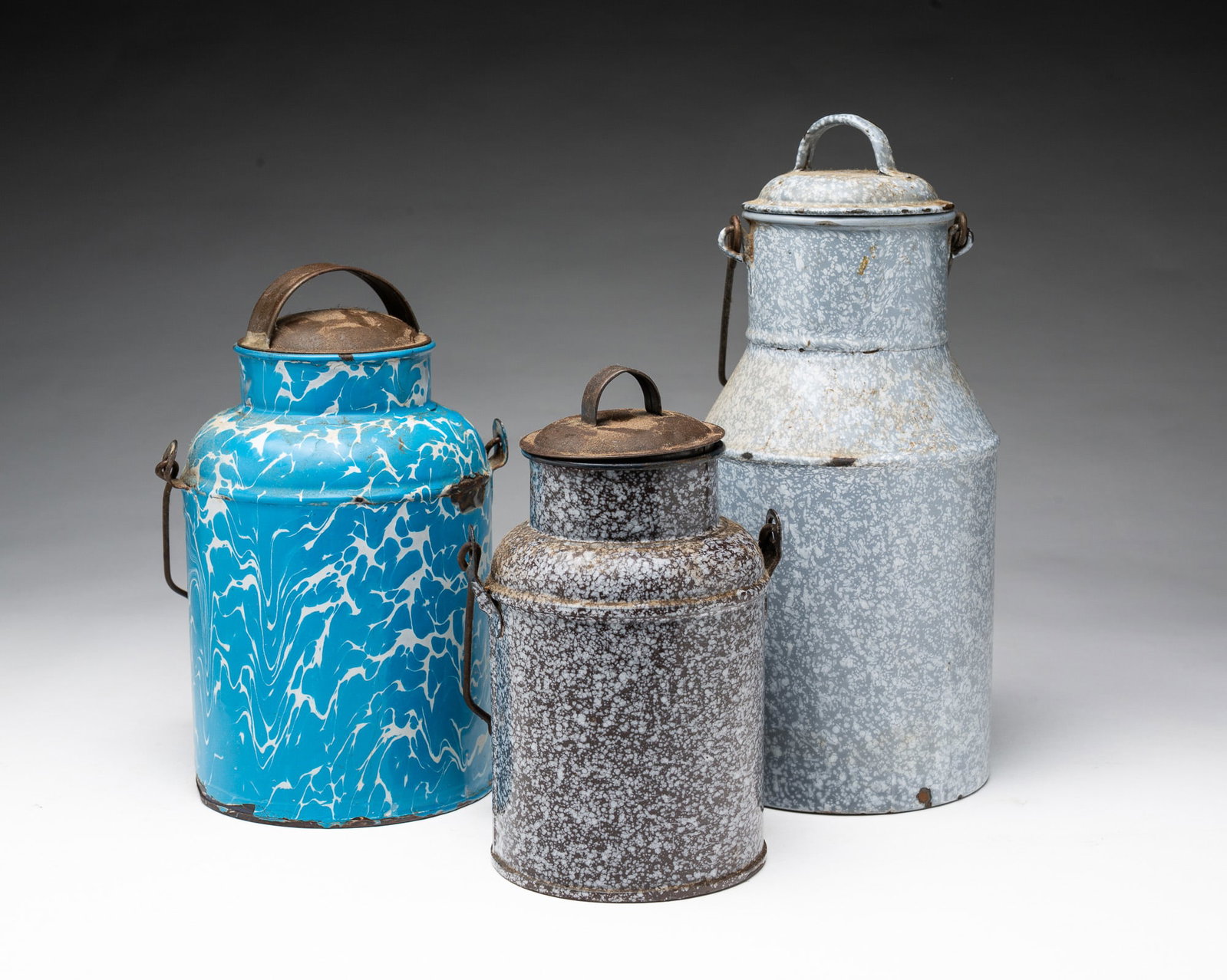 THREE GRANITEWARE CREAM CANS. - 2