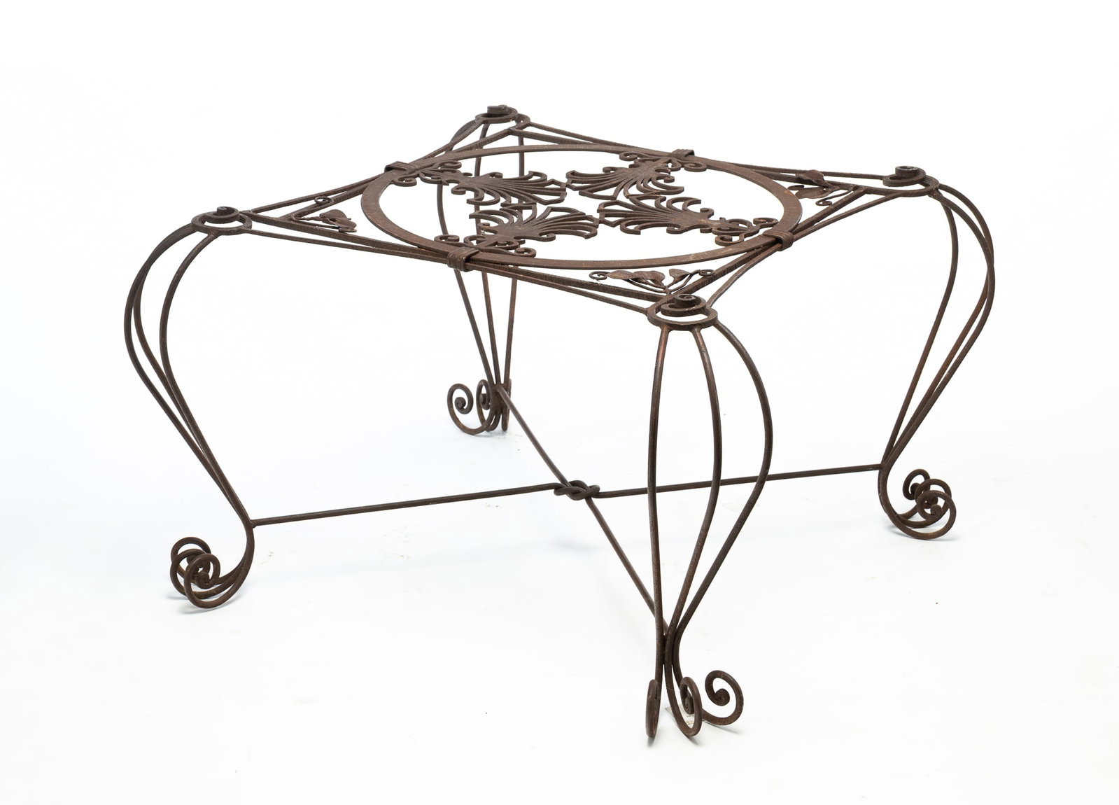 WROUGHT IRON GARDEN TABLE BASE WITH SCROLLED LEGS.: WROUGHT IRON GARDEN TABLE BASE WITH SCROLLED LEGS. American, 19th Century. Of square form decorated with fan shapes within a circle, leaves at corners, and cabriole-style legs consisting of three scro