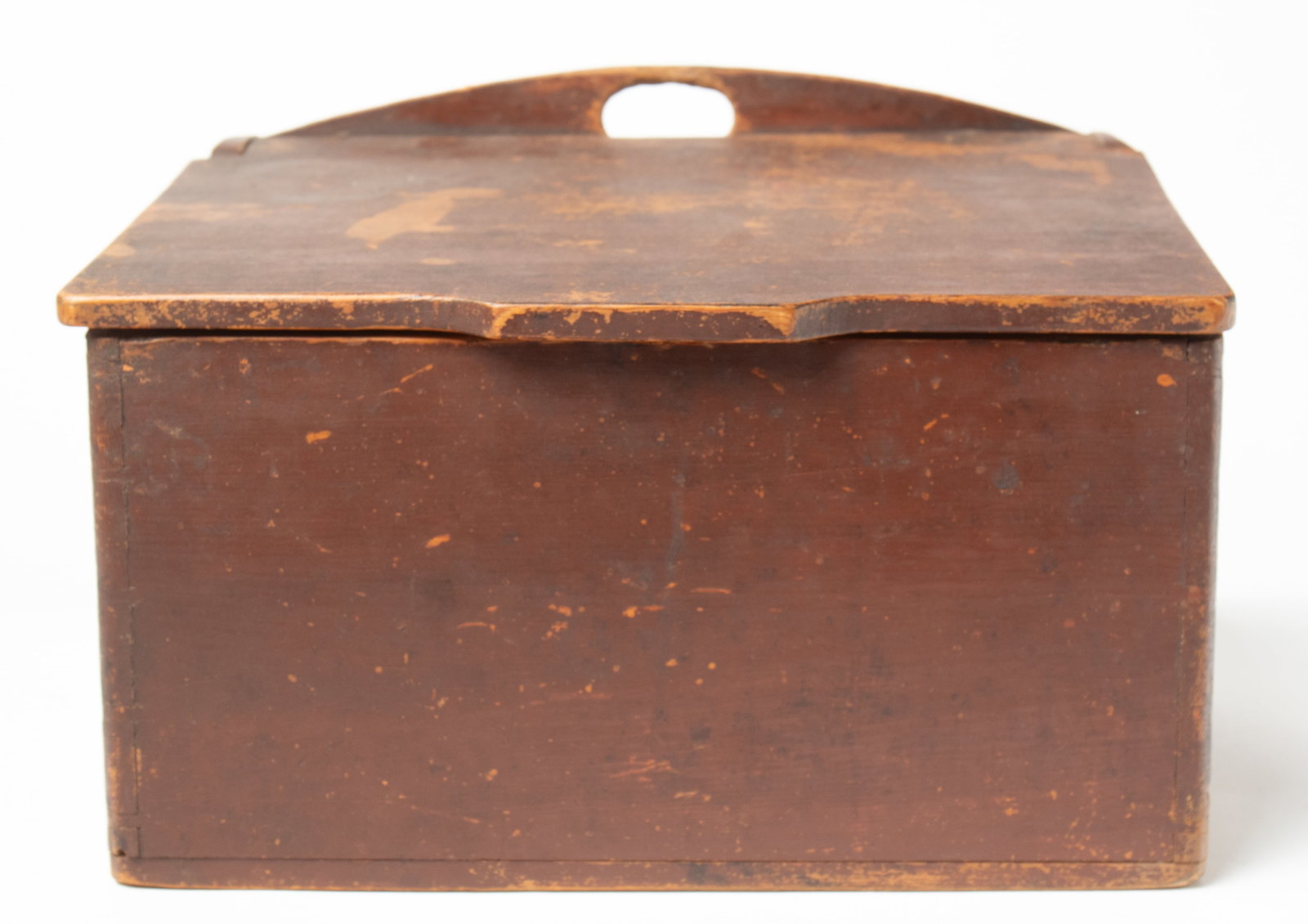 WALL BOX IN ORIGINAL RED PAINT.: WALL BOX IN ORIGINAL RED PAINT. American (found in Ephrata, Pennsylvania), 19th Century. Dovetailed and pegged construction; having a slanted and doweled lid; unusual rounded side dovetails; 10"h. 14.
