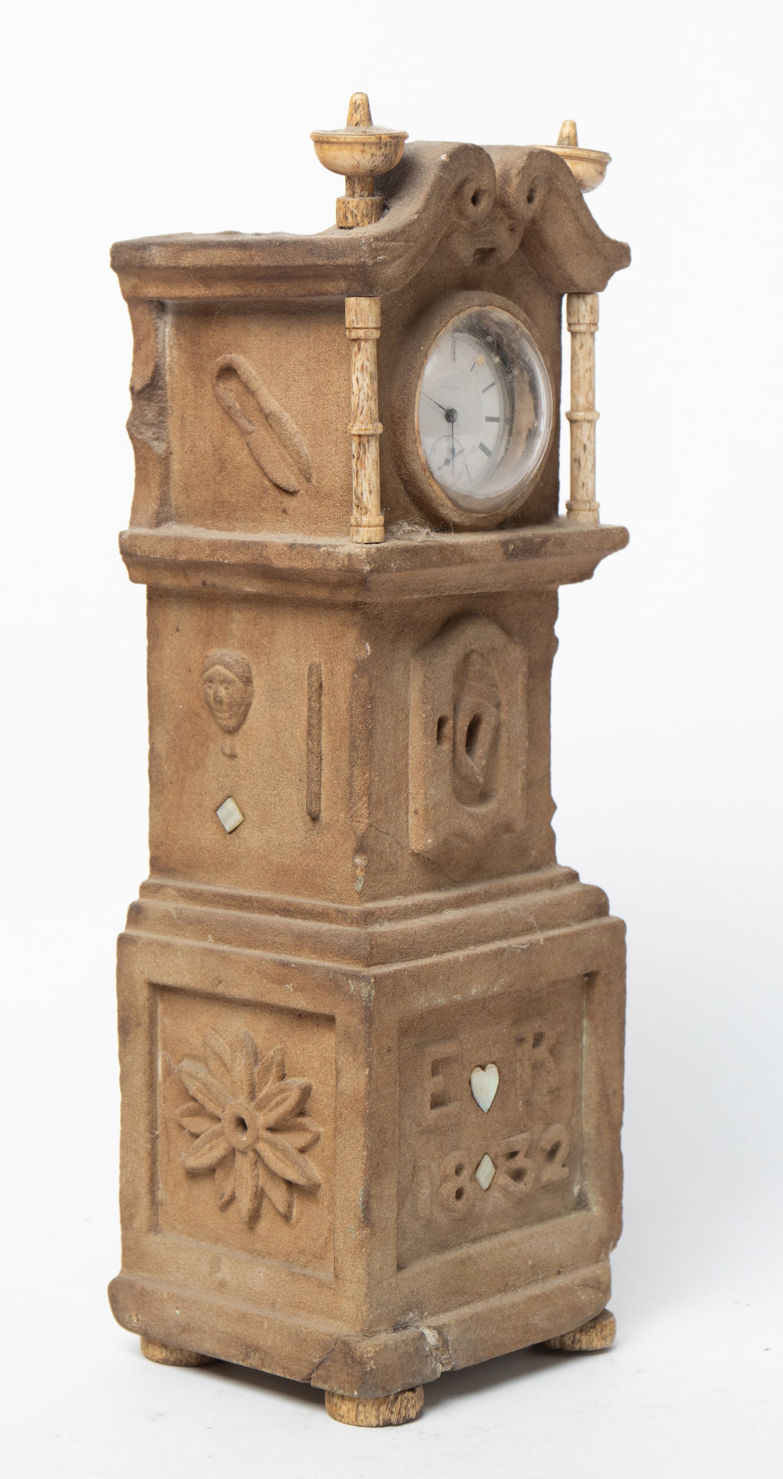 OHIO FOLK ART CARVED STONE WATCH HUTCH IN THE FORM OF A TALL CASE CLOCK INITIALED "E.R." AND DATED: OHIO FOLK ART CARVED STONE WATCH HUTCH IN THE FORM OF A TALL CASE CLOCK INITIALED "E.R." AND DATED 1832. American, 19th Century. Turned bone finials, pilasters, and bun feet, broken arch pediment, car