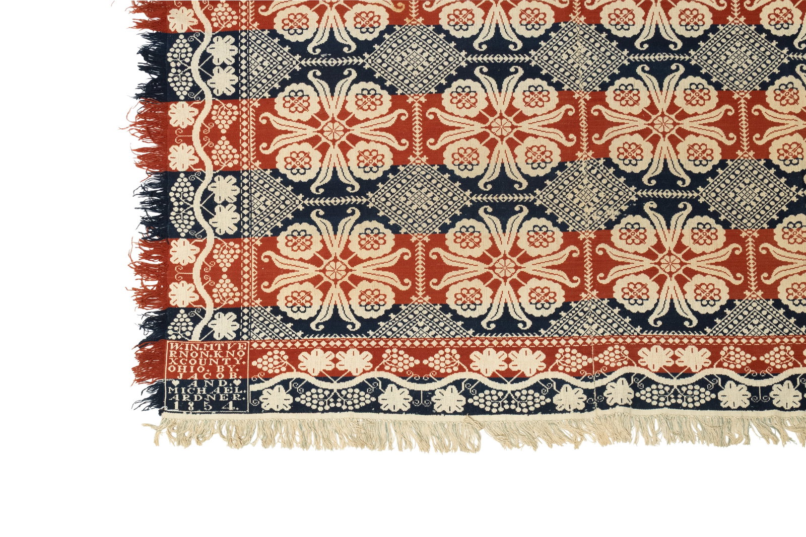 ARDNER BROTHERS (KNOX COUNTY, OHIO) SUMMER-WINTER JACQUARD COVERLET DATED 1854.: ARDNER BROTHERS (KNOX COUNTY, OHIO) SUMMER-WINTER JACQUARD COVERLET DATED 1854. American, 19th Century. Two-piece blue, red, and white coverlet, the center field with alternating oval floral cartouche