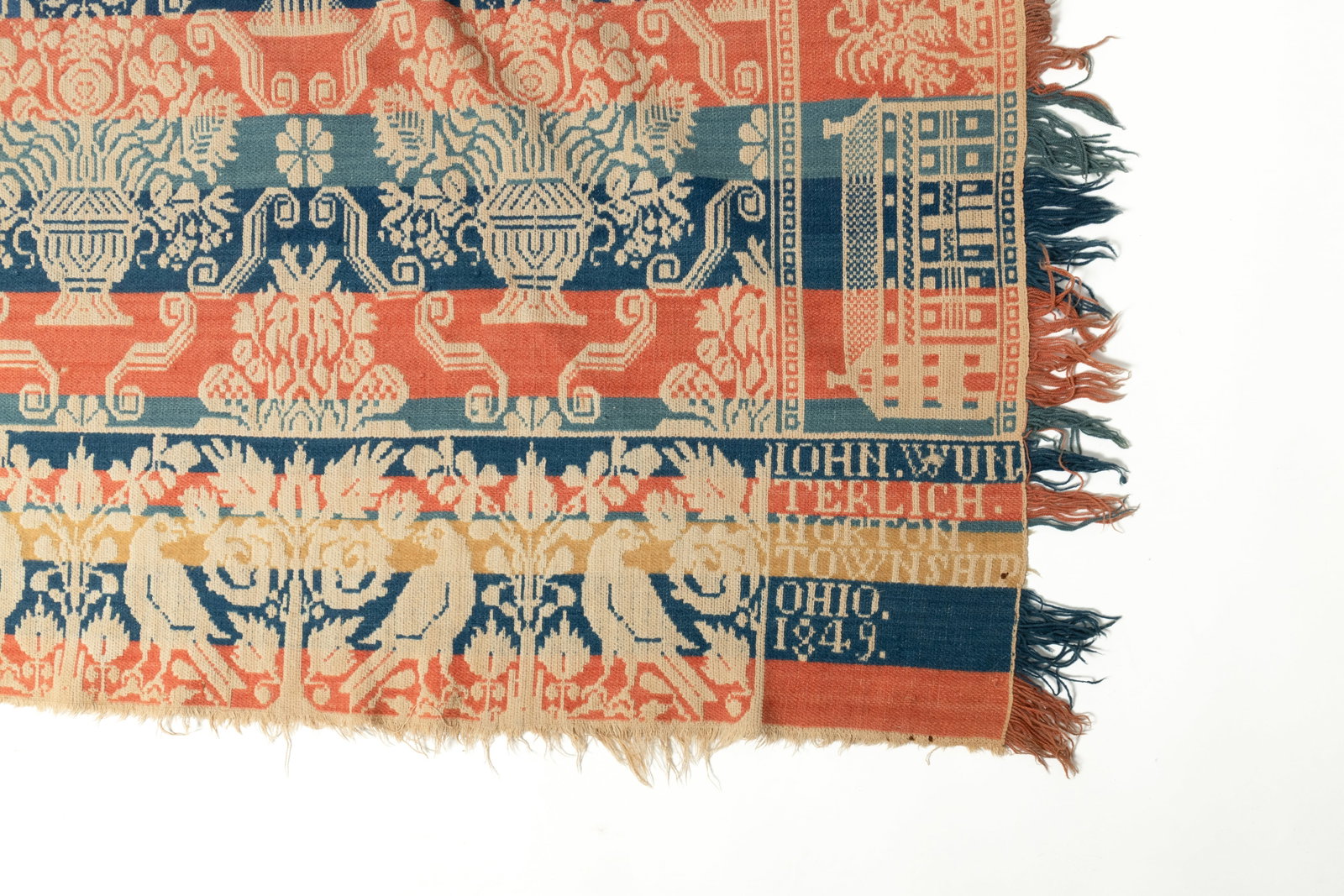 JOHN WUNTERLICH (NORTON TOWNSHIP, OHIO) DOUBLE WEAVE JACQUARD COVERLET DATED 1849.: JOHN WUNTERLICH (NORTON TOWNSHIP, OHIO) DOUBLE WEAVE JACQUARD COVERLET DATED 1849. American, 19th Century. Jacquard coverlet with central seam in red, blue, white, and gold. Central field with urns of