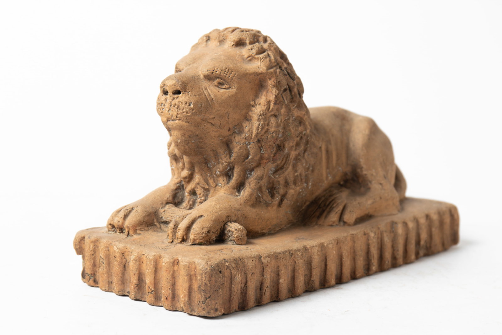 RECUMBENT LION WITH LOG, STAMPED "NEIL A. CONNER". (1 of 6)