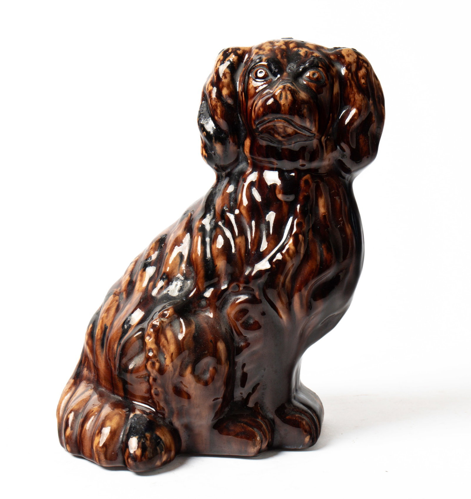YELLOWWARE SEATED SPANIEL WITH ROCKINGHAM GLAZE. (1 of 6)