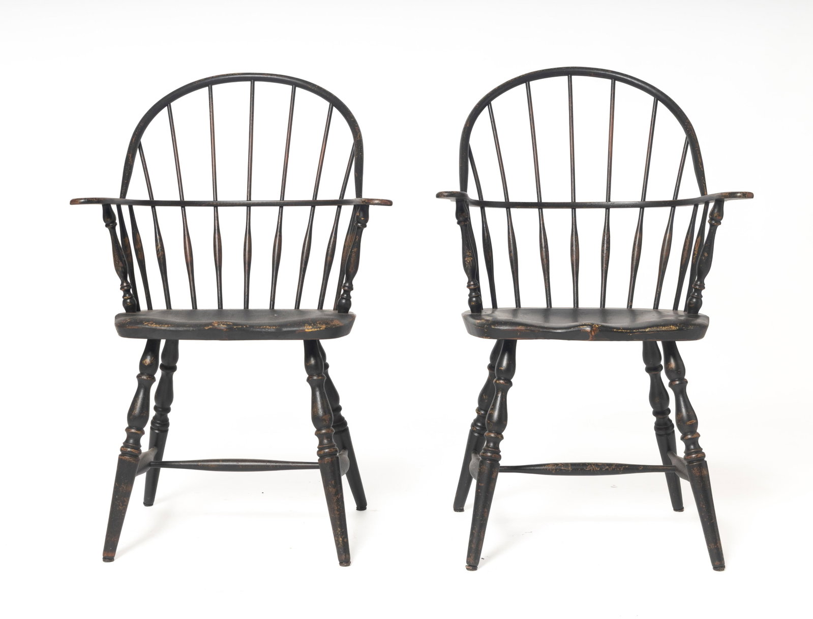 PAIR OF PAINT-DECORATED BOWBACK SWIVEL BARSTOOLS BY DAVID T. SMITH.: PAIR OF PAINT-DECORATED BOWBACK SWIVEL BARSTOOLS BY DAVID T. SMITH. American (Lebanon, Ohio), contemporary. Spindle backs, shaped seats, and nicely turned legs and "H" stretcher. In layered, distresse