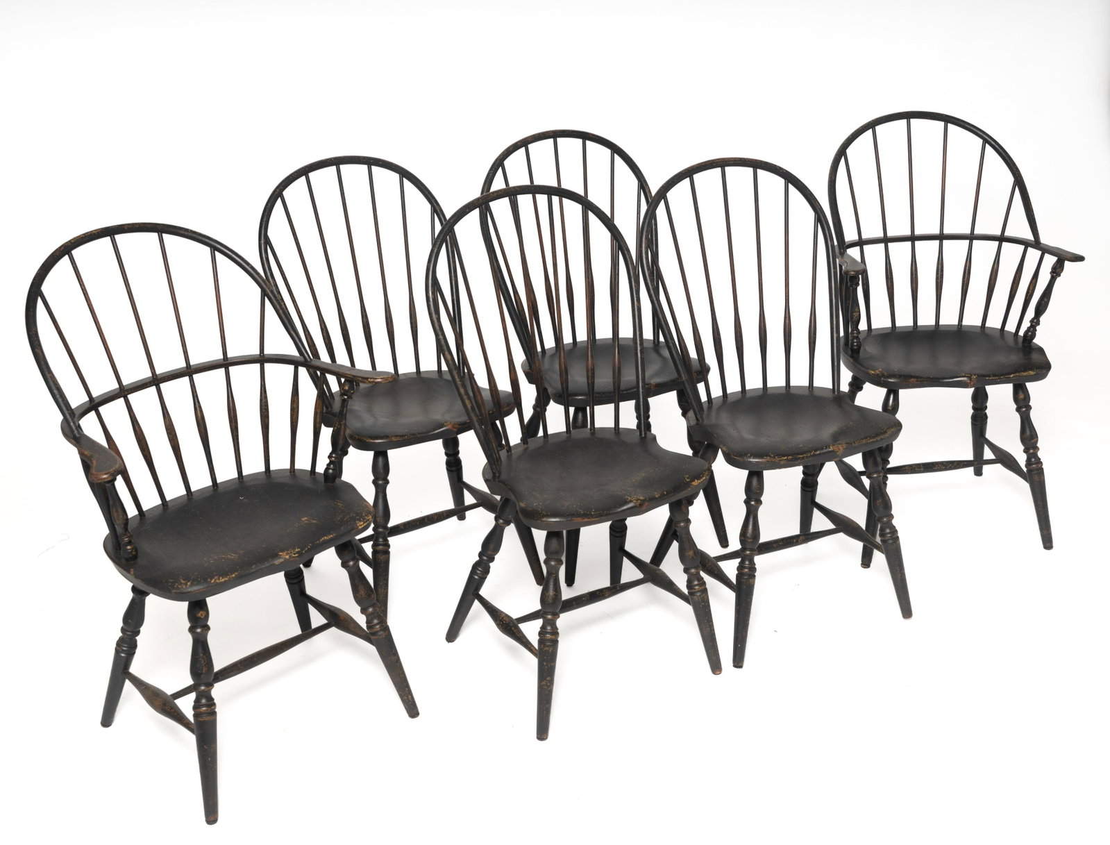 SIX WINDSOR CHAIRS BY DAVID T. SMITH.: SIX WINDSOR CHAIRS BY DAVID T. SMITH. American, 20th Century. Mixed woods. Two sack backs, plain spindle backs, saddle seats, turned stiles, legs and stretchers, and distressed black paint, 19"seat. 4
