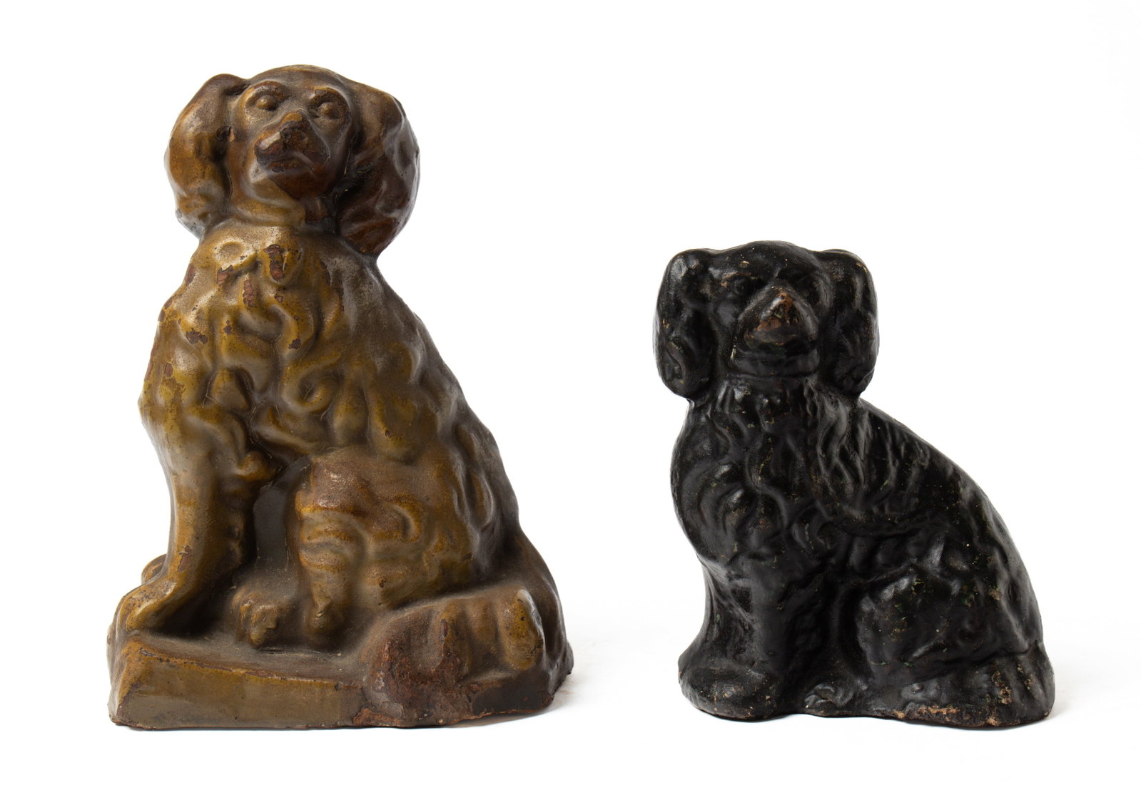 TWO OHIO SEWER TILE SEATED DOGS.: TWO OHIO SEWER TILE SEATED DOGS. American, late 19th or early 20th Century. Each with nicely molded features including one with collar and chain. Provenance: The Lifetime Collection of Martha Magsig