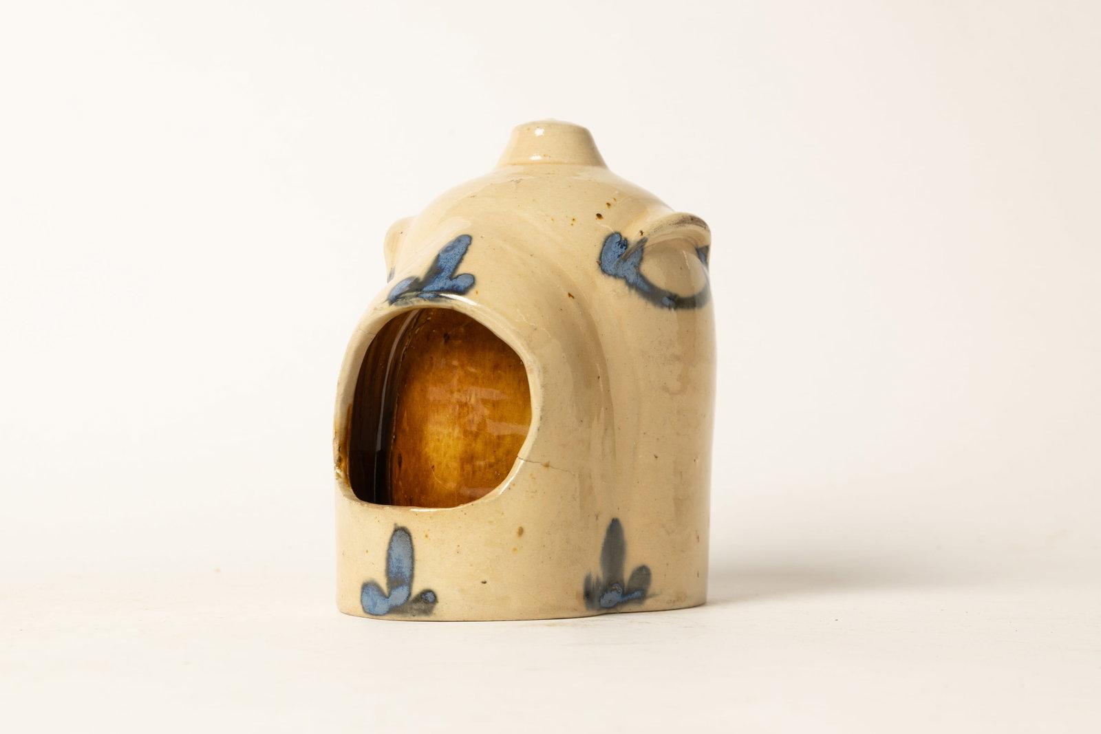 THOMAS HAIG (PHILADELPHIA, PENNSYLVANIA) COBALT-DECORATED STONEWARE CHICKEN WATERER.: THOMAS HAIG (PHILADELPHIA, PENNSYLVANIA) COBALT-DECORATED STONEWARE CHICKEN WATERER. American, 19th Century. Dome-form with flat-top finial, two lug handles, watering window at front with
