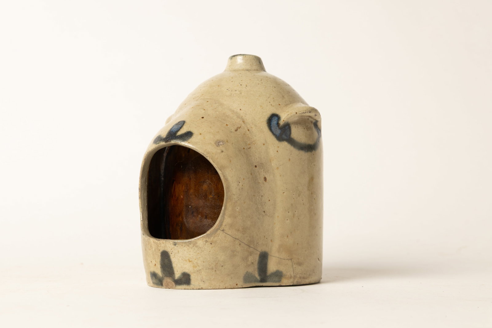 THOMAS HAIG (PHILADELPHIA, PENNSYLVANIA) COBALT-DECORATED STONEWARE CHICKEN WATERER.: THOMAS HAIG (PHILADELPHIA, PENNSYLVANIA) COBALT-DECORATED STONEWARE CHICKEN WATERER. American, 19th Century. Dome-form with flat-top finial, two lug handles, watering window at front with