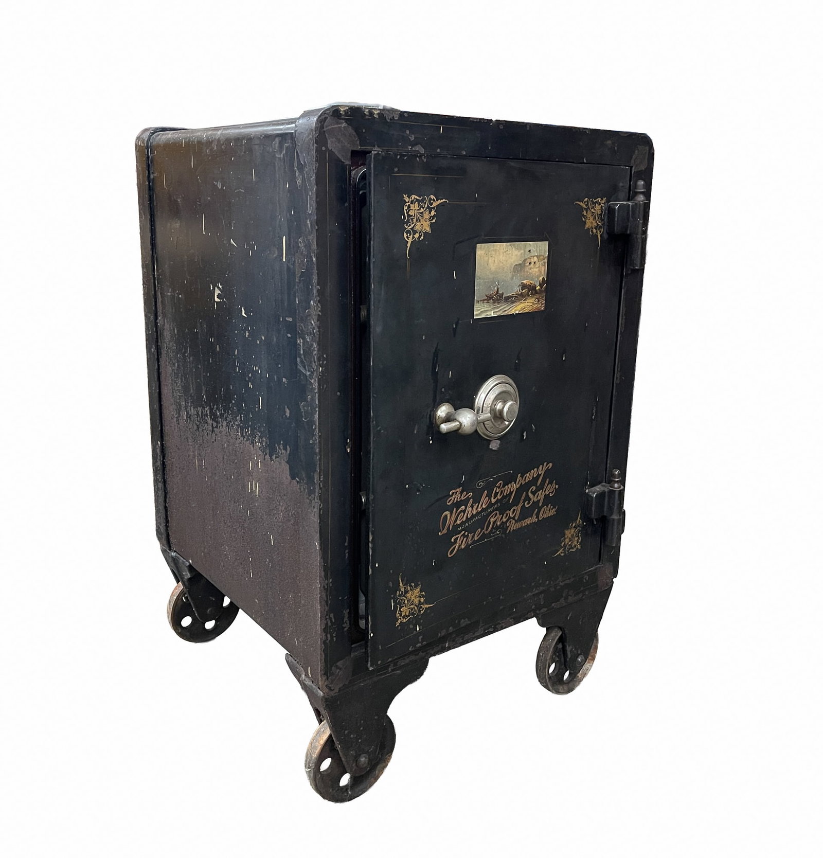 WEHRLE COMPANY (NEWARK, OHIO) FIRE PROOF CAST IRON SAFE. (1 of 8)