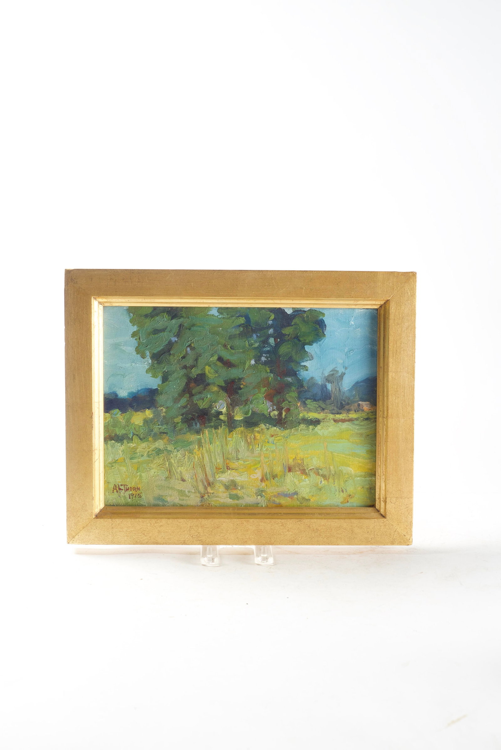 ANNA LOUISE THORNE (OHIO, 1866 - 1965) IMPRESSIONISTIC LANDSCAPE.: ANNA LOUISE THORNE (OHIO, 1866 - 1965) IMPRESSIONISTIC LANDSCAPE. American, Dated 1915. Oil on canvas. Vibrant landscape of trees in a field under a blue sky. Canvas, 8.75"h. 12"w. Frame, 11.5"h. 14.5