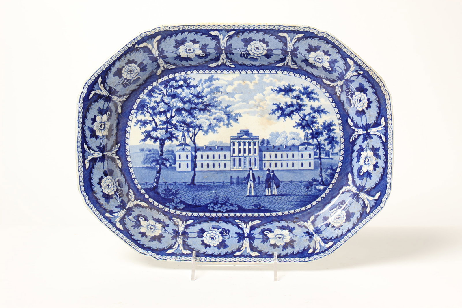 RIDGWAY MEDIUM BLUE" PHILADELPHIA" PLATTER.: RIDGWAY MEDIUM BLUE" PHILADELPHIA" PLATTER. England, mid- 19th Century. Floral border, Palladian building with central main building, hyphens, and dependencies, trees and three gentlemen in