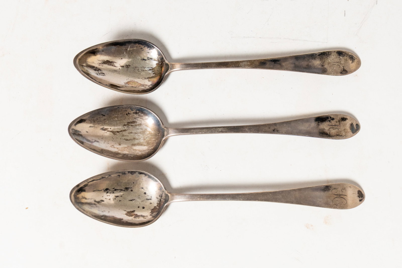 THREE SOUTHERN COIN SILVER SERVING SPOONS.: THREE SOUTHERN COIN SILVER SERVING SPOONS. American, late 18th and early 19th Centuries. Marked A. Blansett, Asa Blansett (Blanchard and many different spellings), Dumfries, Virginia, or Lexington,