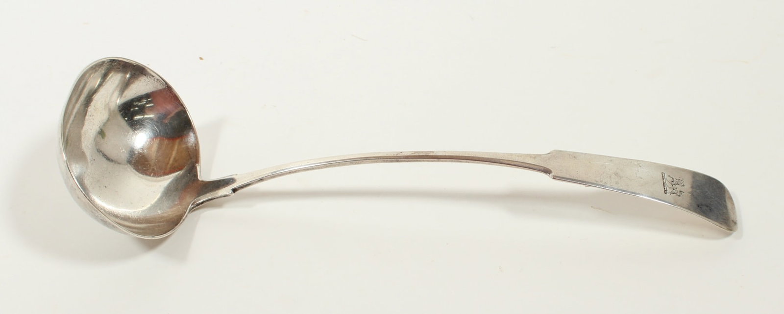 COIN SILVER LADLE MARKED "WJ" AND "ABD".: COIN SILVER LADLE MARKED "WJ" AND "ABD". American, mid- 19th Century. W.J. is possibly William B. Johnnot of Middletown, Connecticut. Fiddleback with a mythical engraved animal. Approx 6.5ozt.