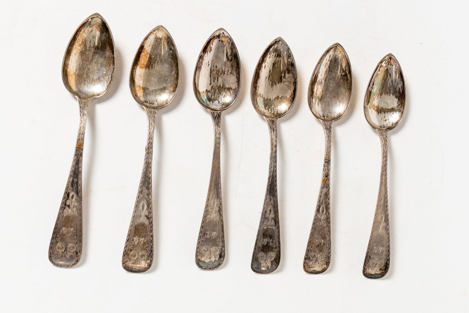 SIX B. AND W. WILSON (PHILADELPHIA, PENNSYLVANIA) COIN SILVER SERVING SPOONS.: SIX B. AND W. WILSON (PHILADELPHIA, PENNSYLVANIA) COIN SILVER SERVING SPOONS. American, second quarter 19th Century. Nice condition with brightwork engraved handles. Approx. 10.5 ozt. Provenance: The