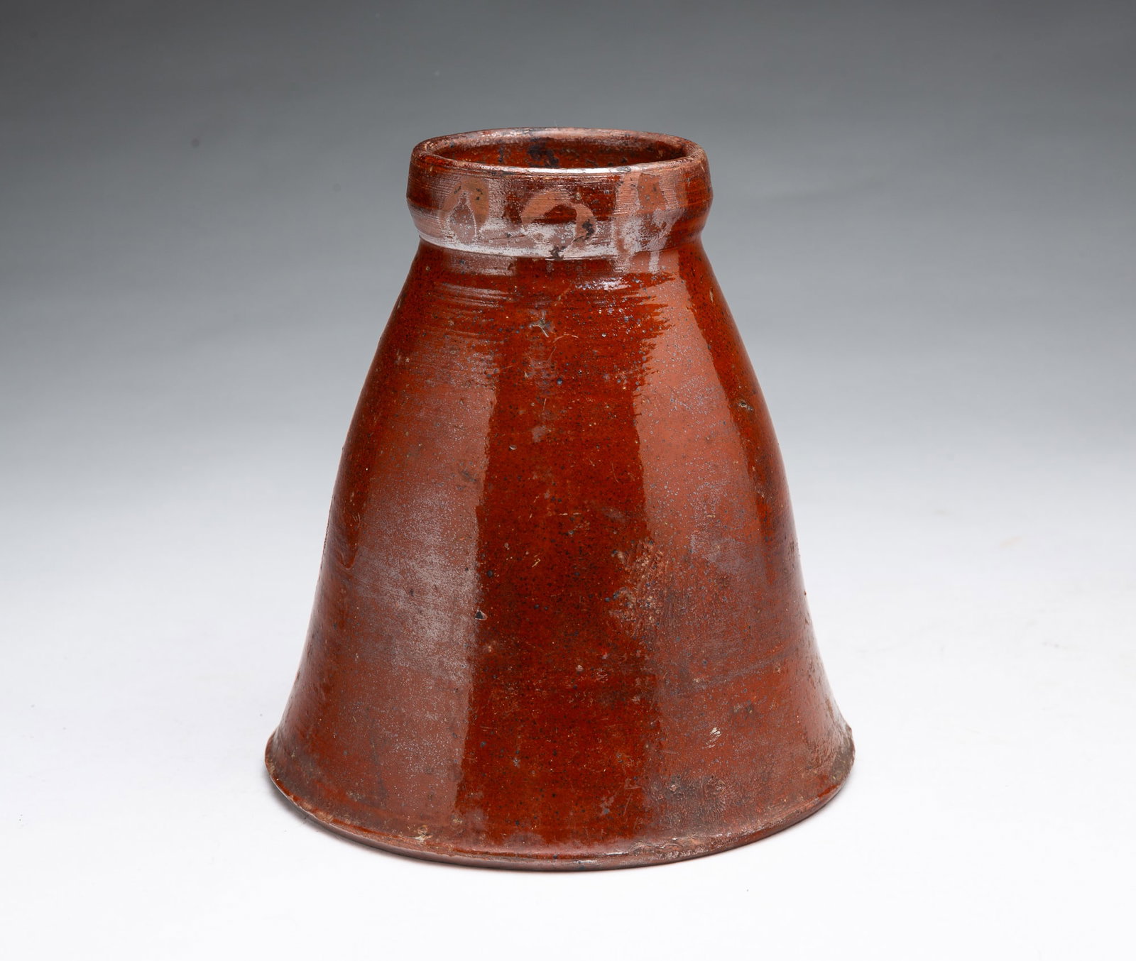 BELL-FORM ALBANY SLIP GLAZED REDWARE JAR. (1 of 3)