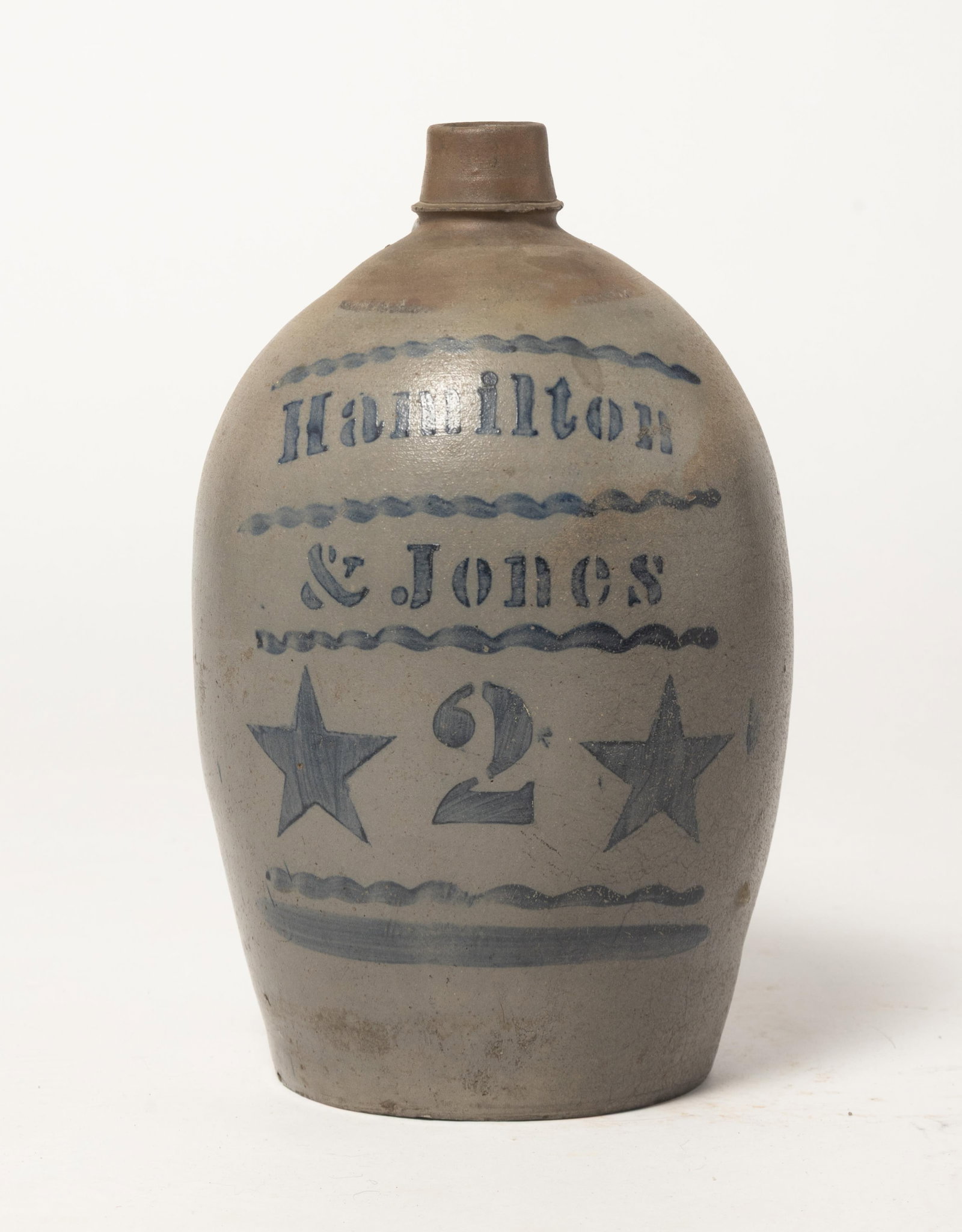 HAMILTON & JONES (GREENSBORO, PENNSYLVANIA) TWO GALLON STONEWARE JUG WITH STENCILED BLOCK STAR: HAMILTON & JONES (GREENSBORO, PENNSYLVANIA) TWO GALLON STONEWARE JUG WITH STENCILED BLOCK STAR COBALT DECORATION. American (Southwestern Pennsylvania), 19th Century. Of ovoid form with straight rim, i