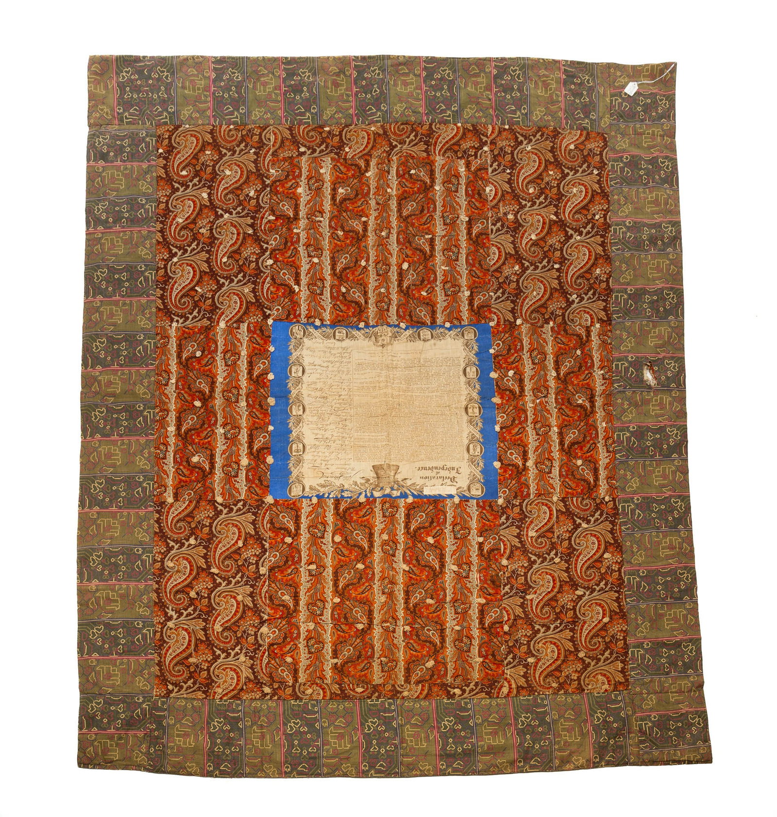 UNITED STATES CENTENNIAL QUILT WITH DECLARATION OF INDEPENDENCE CENTER.: UNITED STATES CENTENNIAL QUILT WITH DECLARATION OF INDEPENDENCE CENTER. Third quarter 19th Century. Cotton. Printed Declaration at center surrounded by thirteen colony seals. Paisley and Native Americ
