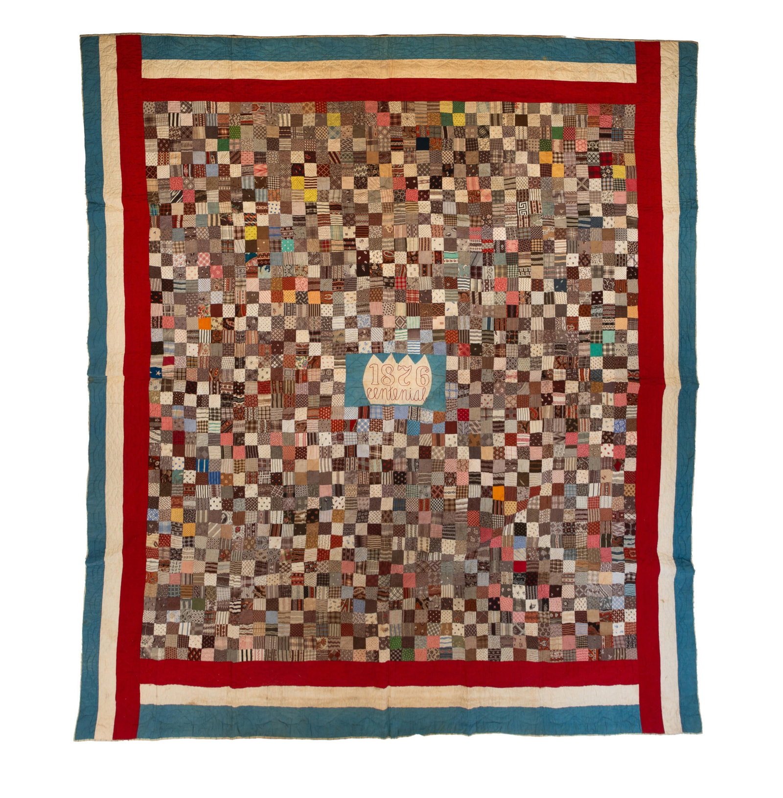 AMERICAN CENTENNIAL PIECEWORK QUILT.: AMERICAN CENTENNIAL PIECEWORK QUILT. Fourth quarter 19th Century. Cotton. Red, white, and blue border, multicolored square patch field, and center rectangular light blue reserve with white crown