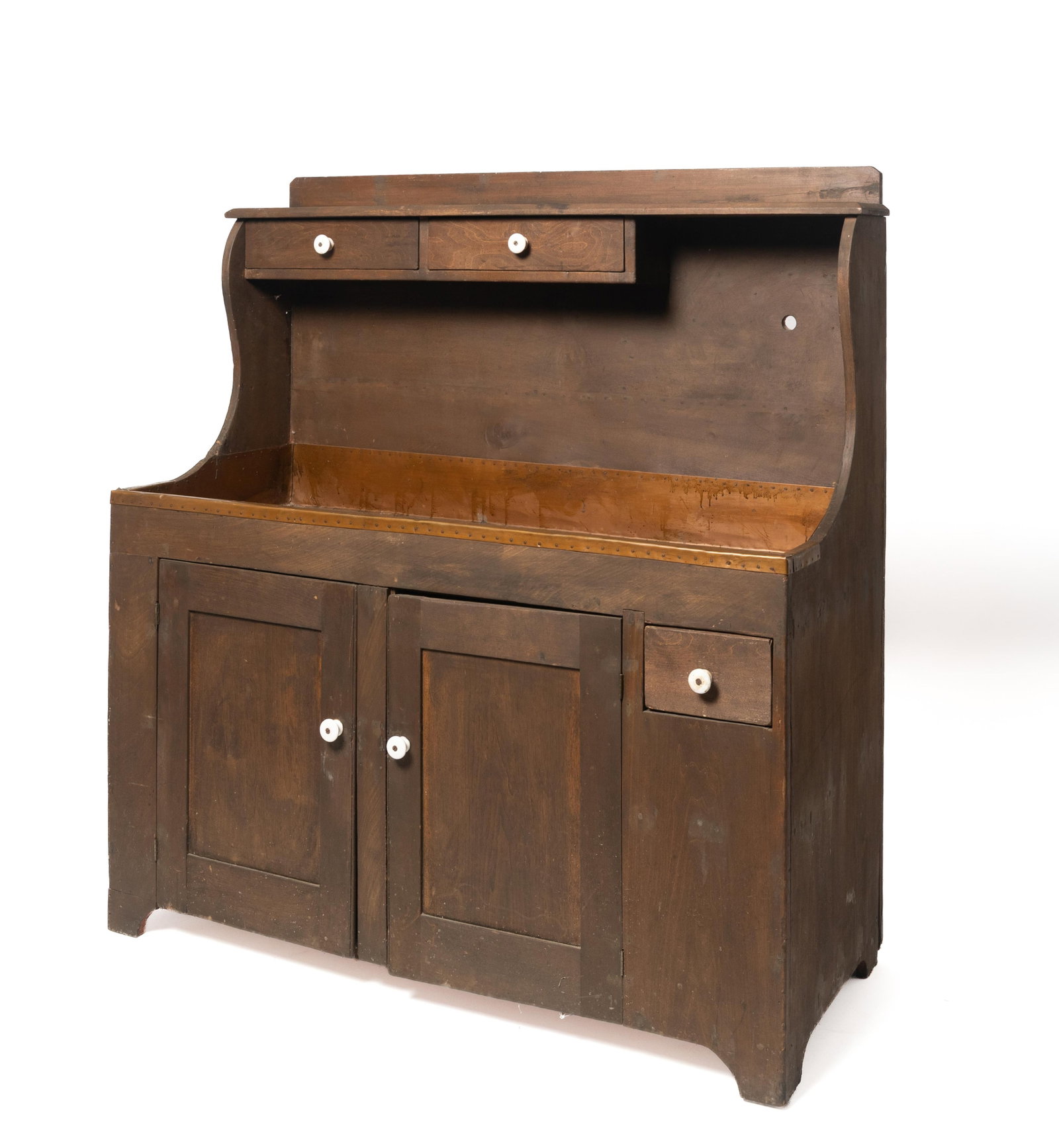 HIGH-BACK DRY SINK WITH GREENISH-GRAY PAINT.: HIGH-BACK DRY SINK WITH GREENISH-GRAY PAINT. American, 19th Century. Poplar. Backsplash with rounded corners, top shelf with two lower dovetailed drawers, shaped ends, two lower single panel doors wit