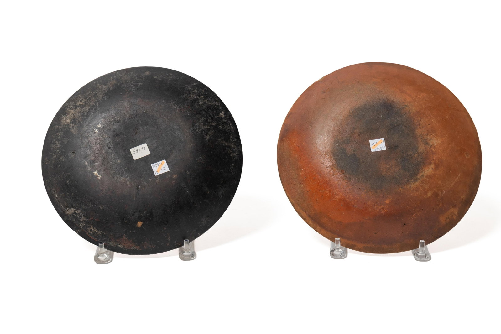TWO SLIP-DECORATED REDWARE PLATES. - 2