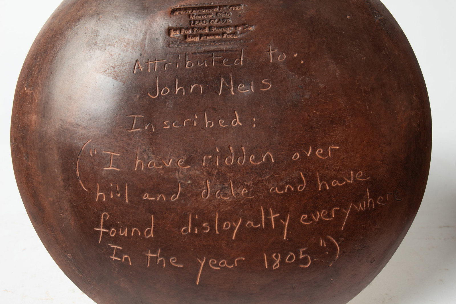 THREE TURTLE CREEK REDWARE PLATES. - 8