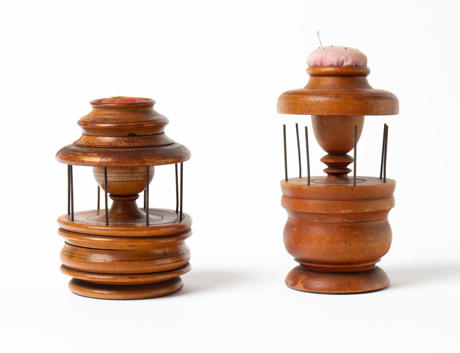 TWO TREEN SEWING CADDIES. - 2