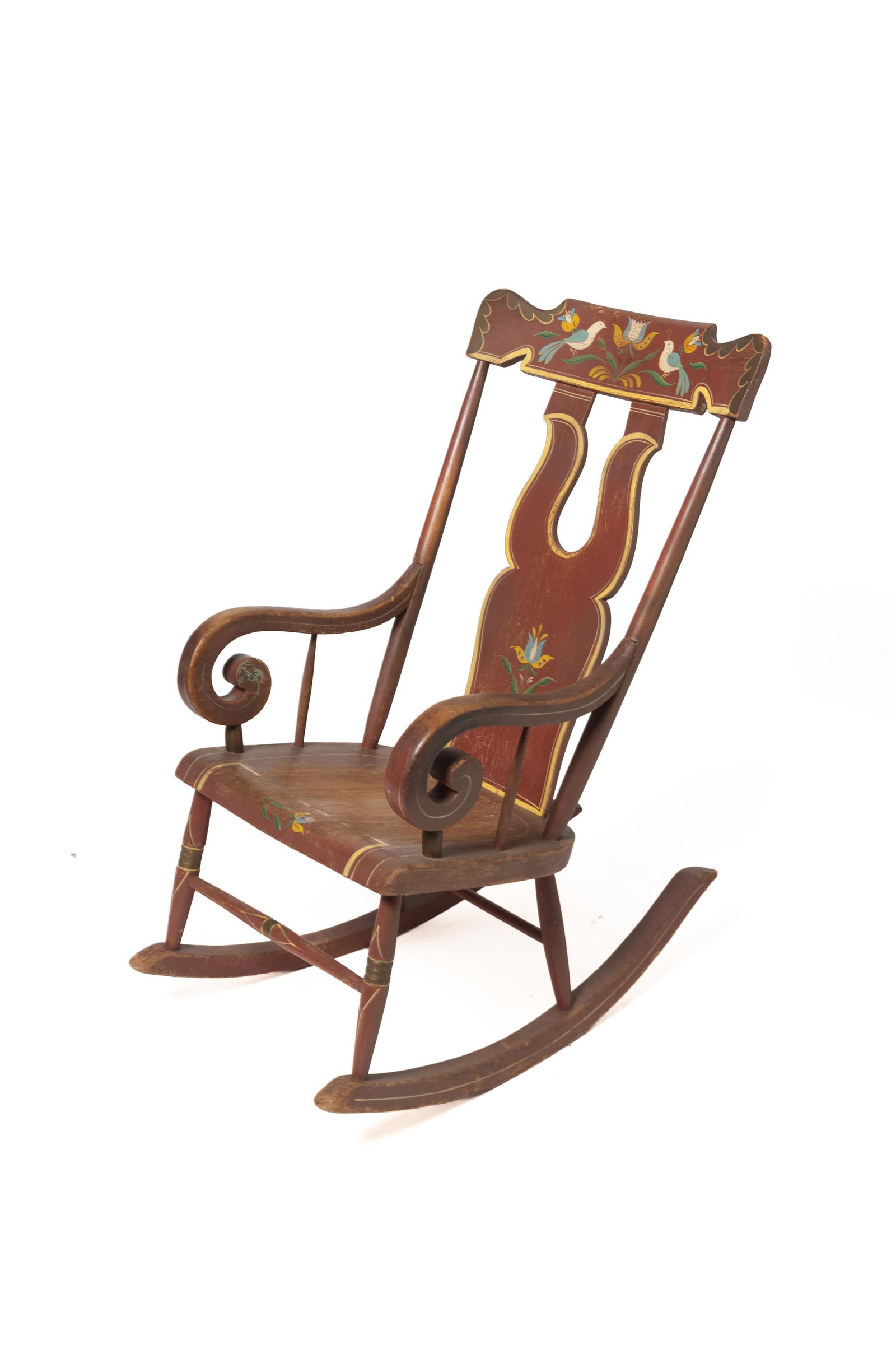 PENNSYLVANIA PAINT-DECORATED ROCKING CHAIR.: PENNSYLVANIA PAINT-DECORATED ROCKING CHAIR. American, mid- 19th Century. Mixed woods. Angel wing crest, boot jack backsplat, simple turnings, and scrolled arms. Original brown paint, yellow striping,