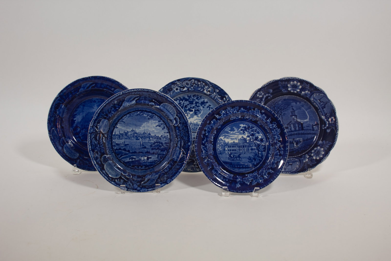 FIVE HISTORICAL BLUE PLATES WITH AMERICAN SCENES.: FIVE HISTORICAL BLUE PLATES WITH AMERICAN SCENES. England, mid- 19th Century. Two are Enoch Wood & Sons with shell borders. "City of Albany, State of New York." 10"d. and "Pine Orchard Hotel, Catskill