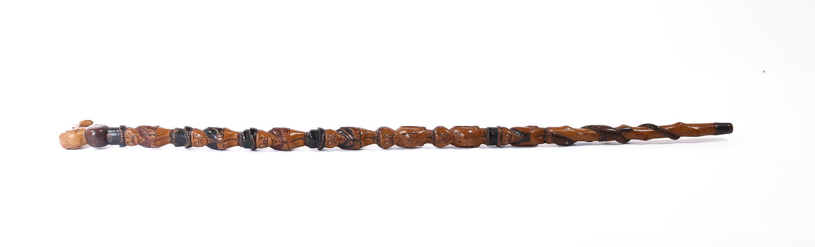 FOLK ART CARVED AND PAINTED WOODEN CANE OF STACKED FIGURES AND A LIZARD.: FOLK ART CARVED AND PAINTED WOODEN CANE OF STACKED FIGURES AND A LIZARD. American, Late 19th or Early 20th Century. Handle carved as a seated nude person with a large nose and sticking their tongue