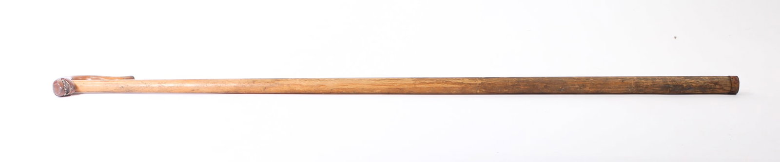 FOLK ART CARVED AND PAINTED WOODEN CANE WITH EEL HANDLE.: FOLK ART CARVED AND PAINTED WOODEN CANE WITH EEL HANDLE. American, 19th Century. Handle carved as an eel with incised scales bearing white-painted teeth between red lips, with inset eyes, the shaft