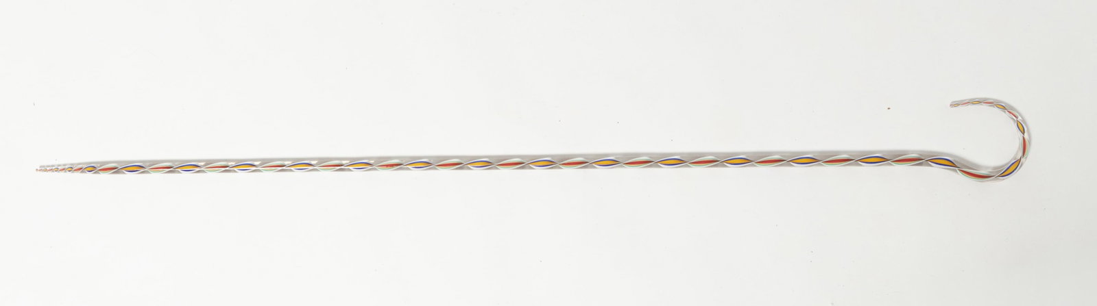 MARBLE CANE WITH MULTI COLORED SWIRLED CENTER.: MARBLE CANE WITH MULTI COLORED SWIRLED CENTER. American, 20th Century. Sheppard's crook handle tapers to a point at the bottom with a brightly colored swirl to center. 52.25"l.