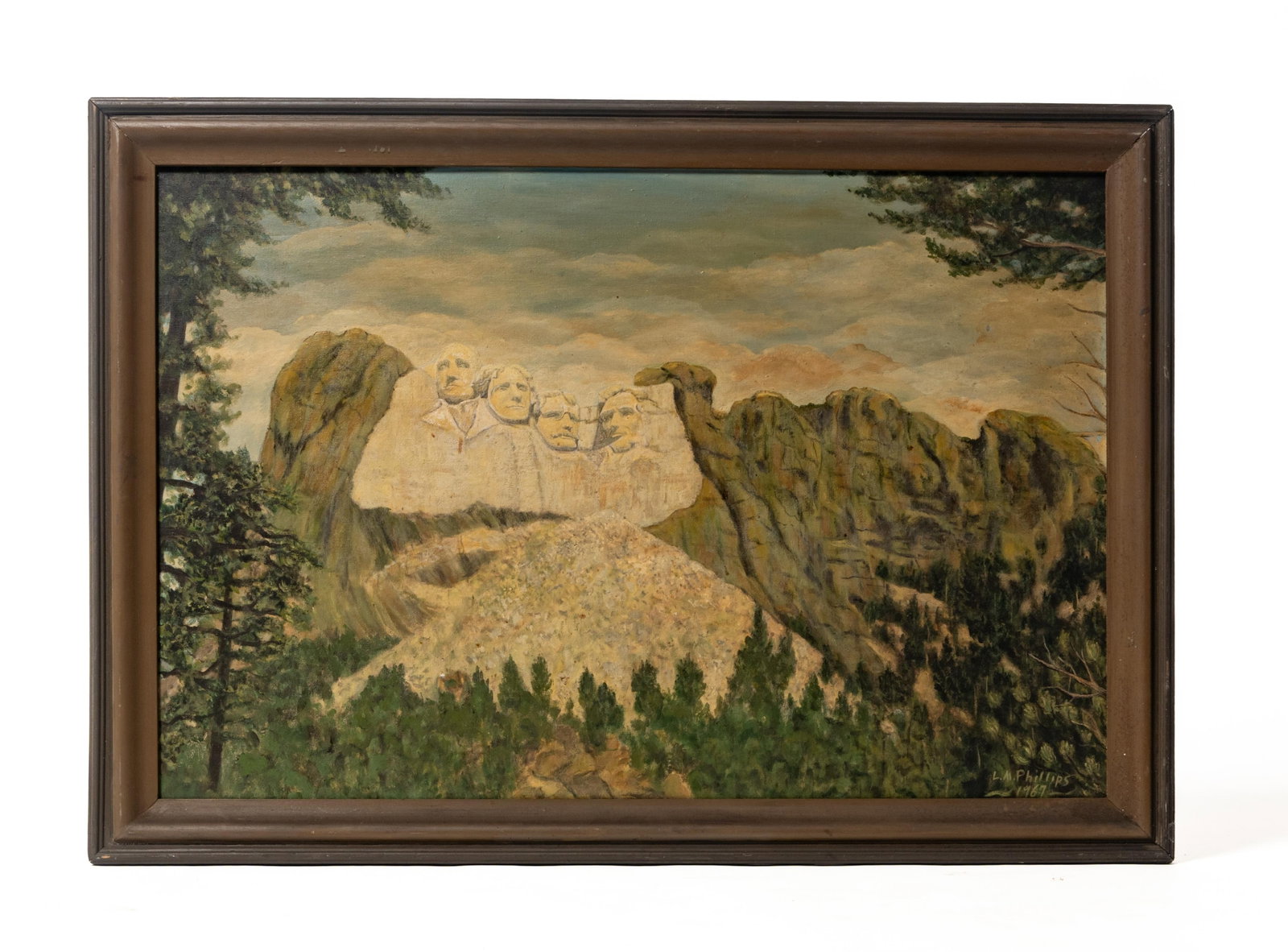 REVEREND L.M. PHILLIPS (OHIO, 1900 - 1991) MOUNT RUSHMORE LANDSCAPE OIL ON CANVAS.: REVEREND L.M. PHILLIPS (OHIO, 1900 - 1991) MOUNT RUSHMORE LANDSCAPE OIL ON CANVAS. American, 20th Century. Oil on canvas. Signed and dated "1967" lower right. A view of Mount Rushmore and the