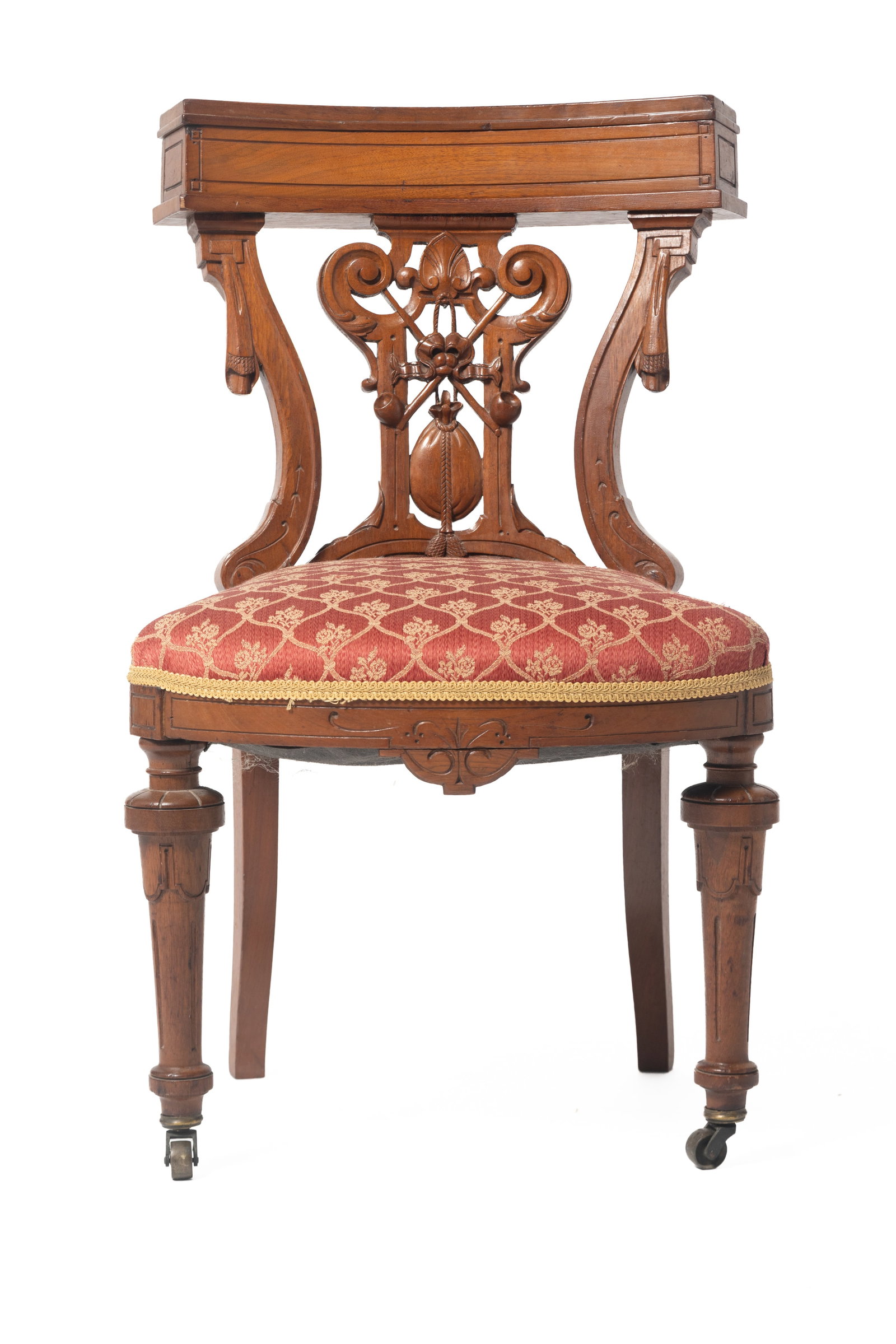 VICTORIAN COCK FIGHTING CHAIR.: VICTORIAN COCK FIGHTING CHAIR. American, second half 19th Century. Watnut. Rounded crest with hinged lid and interior well, carved backsplat with scrolling, anthemion, ribbons, and drawstring purse, u