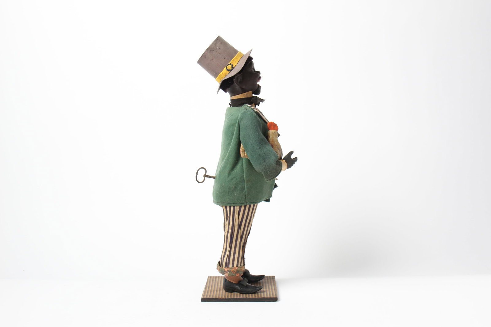 CLOCKWORK FIGURE HOLDING A CHICKEN. - 5