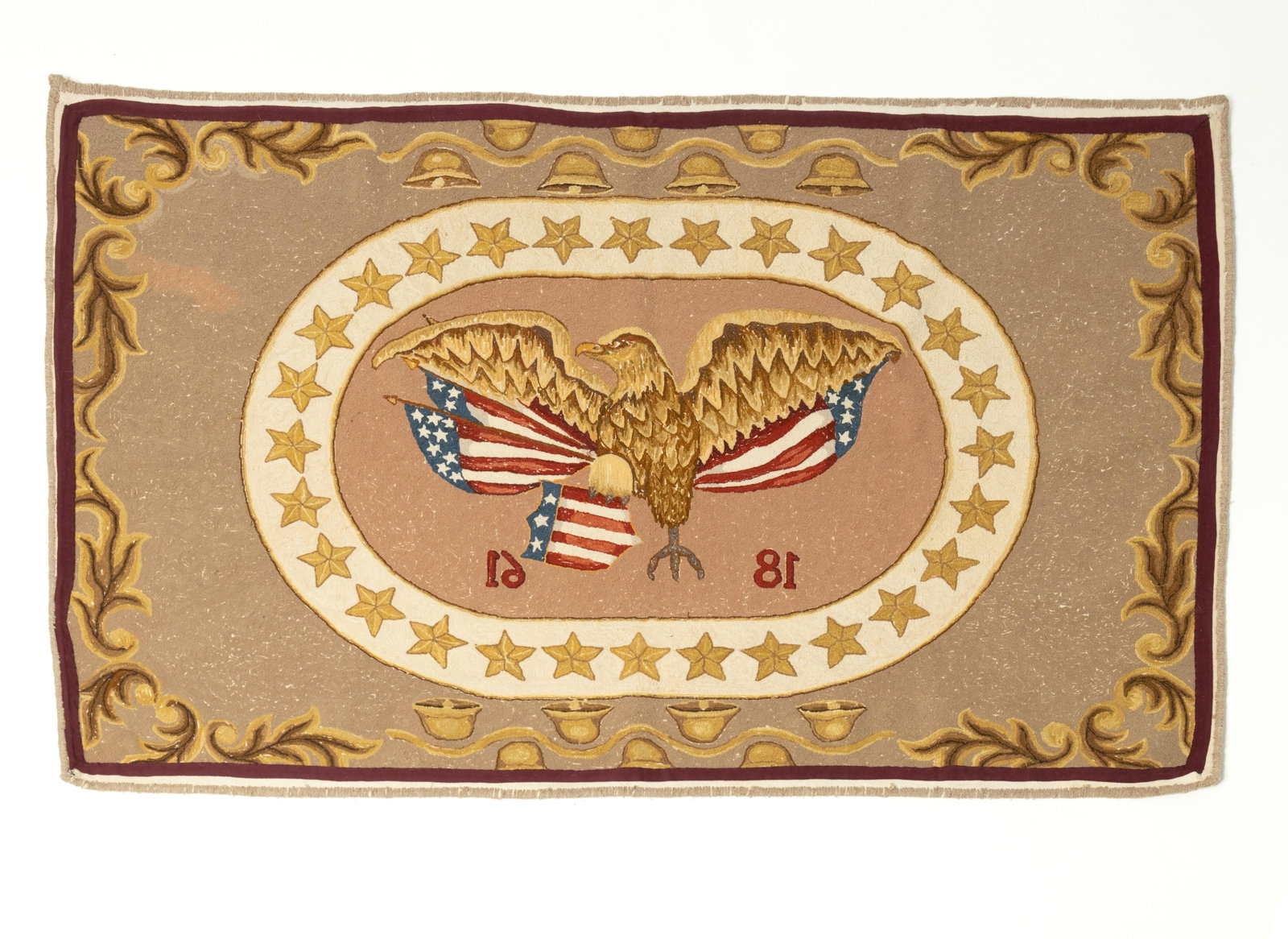 LARGE PATRIOTIC HOOKED RUG.: LARGE PATRIOTIC HOOKED RUG. American, Early 20th Century. Rectangular rug with a tan field, border of bells and flourishes, a central oval reserve filled with a spread-winged eagle atop a shield clutc